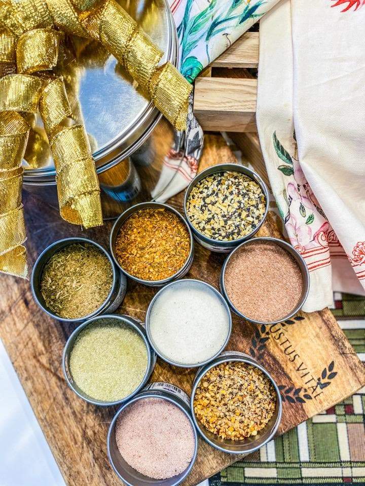 https://www.gustusvitae.com/cdn/shop/products/gourmet-pantry-essentials-gift-pack-8-gourmet-seasonings-salts-in-a-handsome-gift-tin-collections-gift-sets-gustus-vitae-373766_1024x1024@2x.jpg?v=1623368651